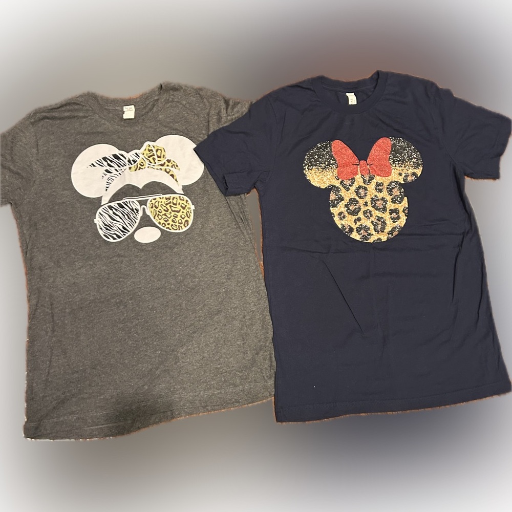 Disney woman's size medium cute short sleeve T-Shirts with Animal Print Designs.